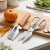 S32fb1f9b5189430fbfc61bb7c357ca9dP.webp Stainless steel peeler with wooden handle for peeling and slicing fruits and vegetables | Durable and smooth operation
