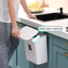 Sa589aa77d7064089b4f68bf9602daf49Q.webp 7/9L Wall Mounted Trash Can Household Galley Waste Bin Hanging Bathroom Trash Can With Lid Food Garbage Bin Kitchen Accessories
