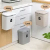 Sa69a8bf5543d4aec924ac9dd4ec8cd0aH.webp 7/9L Wall Mounted Trash Can Household Galley Waste Bin Hanging Bathroom Trash Can With Lid Food Garbage Bin Kitchen Accessories