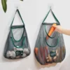 Sab5a787db6484a2cb38976cb24c8b3229.webp Reusable Storage Bags Kitchen Hanging Mesh Bag Home Fruit And Vegetable Storage Net Bag For Ginger Garlic Potatoes Onions